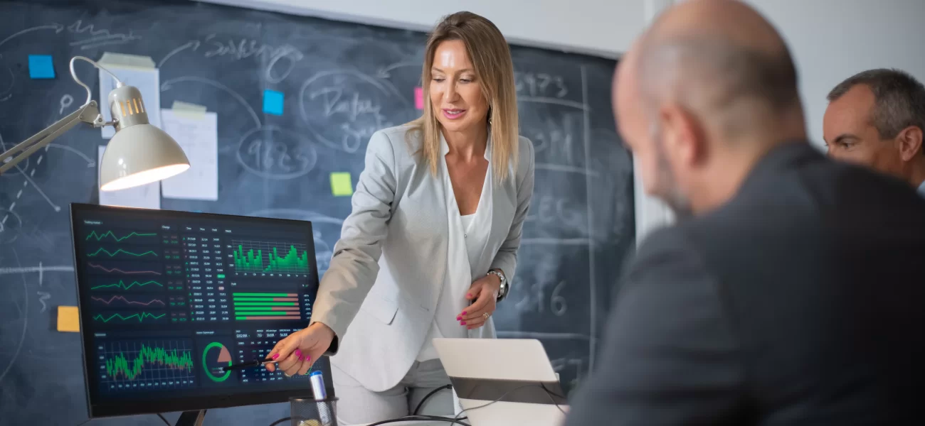 Custom software development team collaborating on a new application in the office